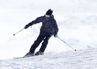 Skier in high mountains