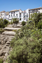 Fototapeta na wymiar Panoramic view from a new bridge in Ronda, one of the famous whi