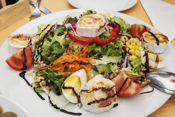 salad Mediterranean salad with egg and brie cheese