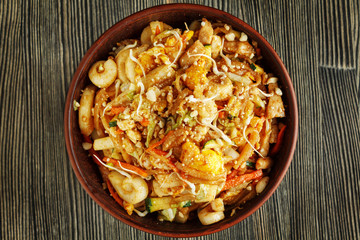 Close-up of Pad Thai on wood