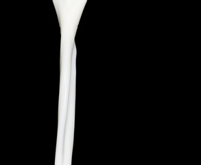 milk on a black background