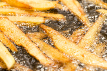 French fries fried in a pan