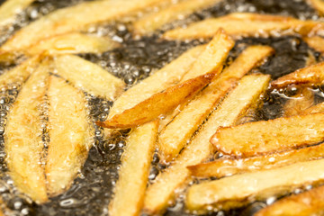 French fries fried in a pan