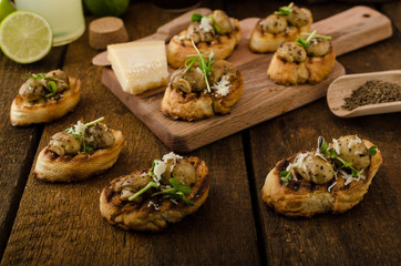 Mushroom snacks on grilled baguette