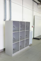 grey luggage storage with cells in the service station