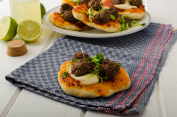 Mini pizza with meatballs