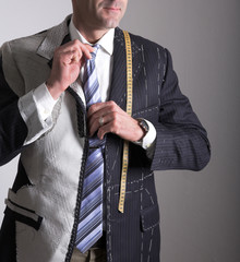 Semi-ready, elegant tailor made suit and man