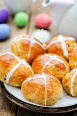 Easter buns with a cross and eggs