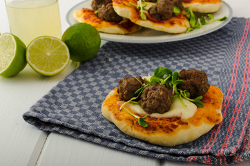 Mini pizza with meatballs