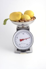 scale with lemons and almonds