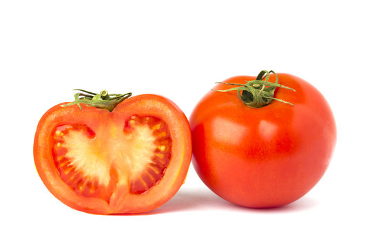 Whole and half tomato