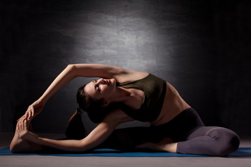 Mature woman practicing yoga