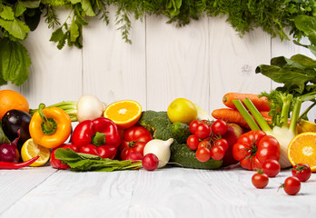 Fruit and vegetable borders on wood table