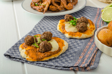 Sports feast - chicken wings, vegetable, french fries, pizza