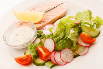 salmon steak with salad