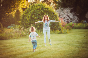 Fototapeta premium Mother and little daughter playing together