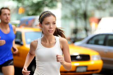 Active people jogging on New York city street, NYC