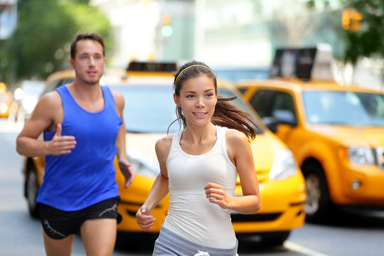 Couple Running On Fifth Avenue, New York NYC