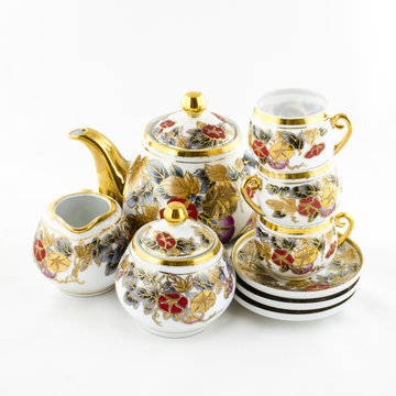 Antique porcelain tea and coffee set with flower motif
