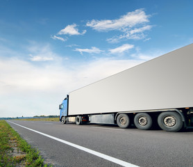 Obraz na płótnie Canvas Truck on asphalt road motion blur