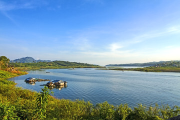 Houseboat on blue water
