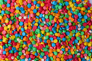 Fototapeta na wymiar Colorful sugar sprinkles background