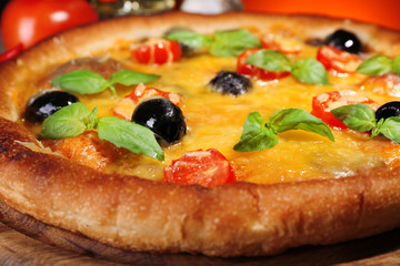 Pizza with cheese and vegetables