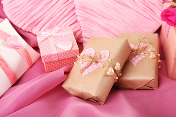 Handmade gifts on Valentine Day, on fabric background