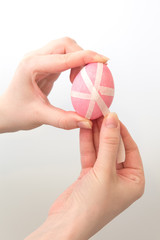 Easter egg with white stripes