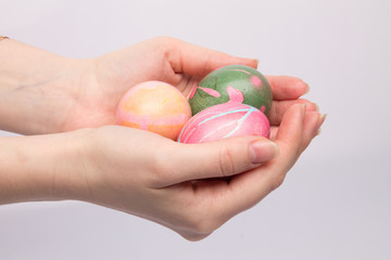 show different beautiful easter egg in hands close up