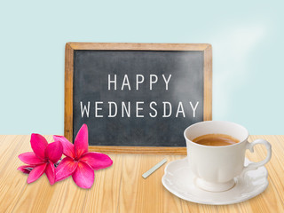 Happy Wednesday on chalkboard with coffee