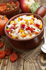 Sweet pilaf with pumpkin, apples and dried fruit