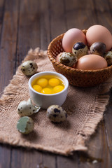 Fototapeta na wymiar Quail and chicken eggs