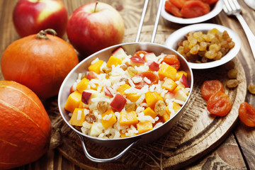 Sweet pilaf with pumpkin, apples and dried fruit