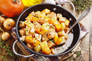 Chicken stew with pumpkin, potatoes and spices
