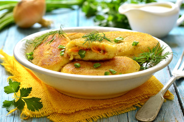 Potato patties with vegetable filling.