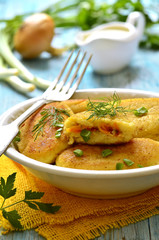 Potato patties with vegetable filling.