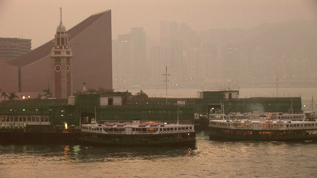 Dawn in HongKong harbor looking from Kowloon