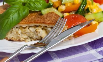 Freshly baked traditional Russian homemade pie with potatoes and