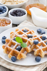 delicious waffles for breakfast, vertical