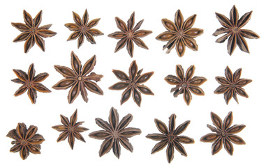 Star anise in a row on white