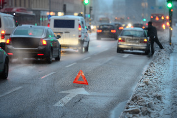 Car broken down, out of fuel in the snow storm