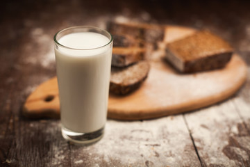 Milk and bread on table. still life