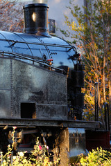 detail  of a old black steam locomotive