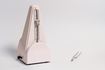 Music pitchfork and metronome