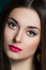 Portrait of attractive brunette girl with perfect make up