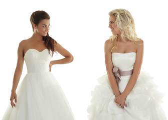 Fototapeta na wymiar Two lovely girlfriends in wedding dresses