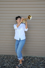 Female trumpet player.