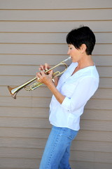Female trumpet player.