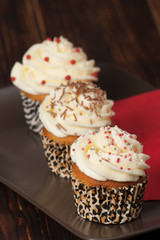 Cupcakes With Cream And Sprinkles